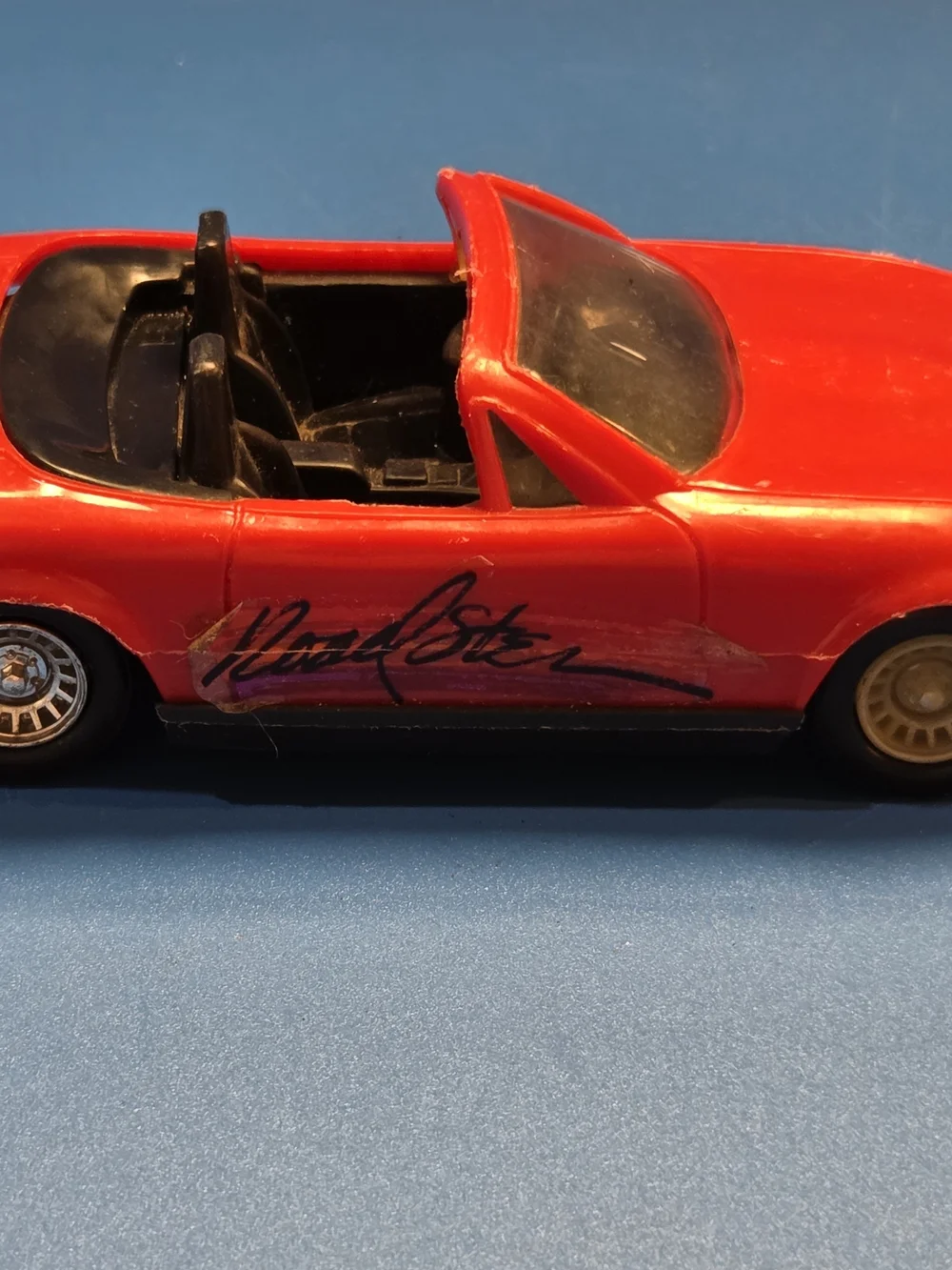 Red Convertible Toy Car with Signature-Style Side Graphic